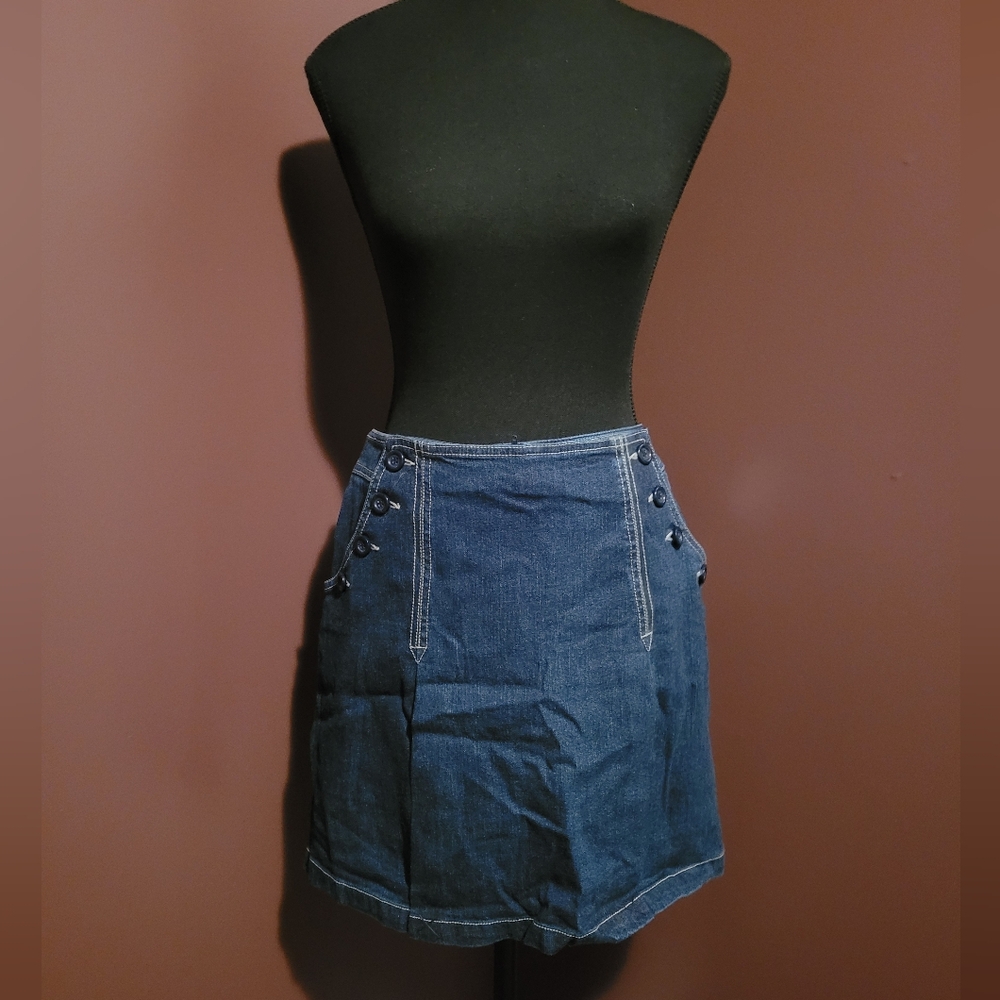 NWT Jessica Dark Jean Skort, with button detail.
